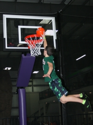 Child Dunking at Appleton Trampoline Basketball Court